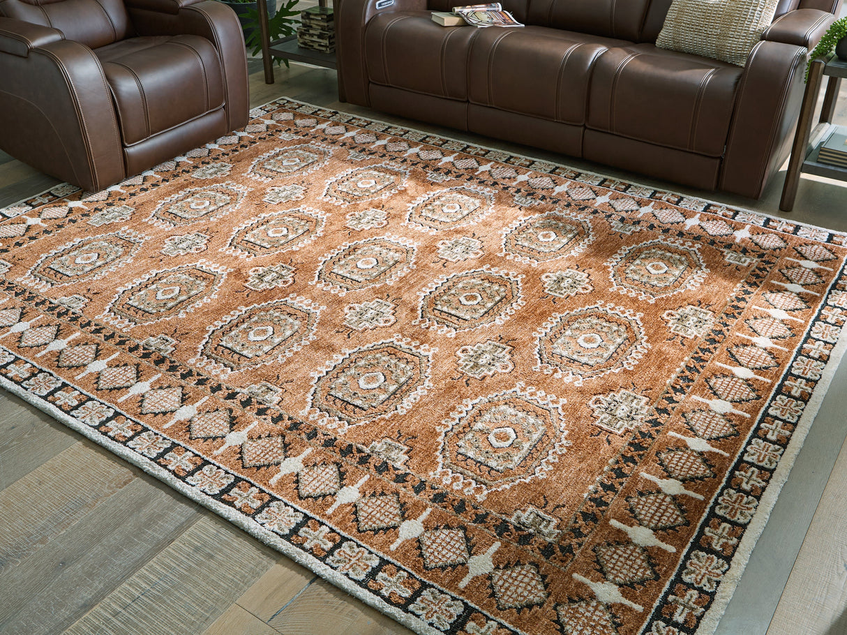 Qaabiz Sienna/Ivory/Black Large Rug by Ashley at Eve Furniture