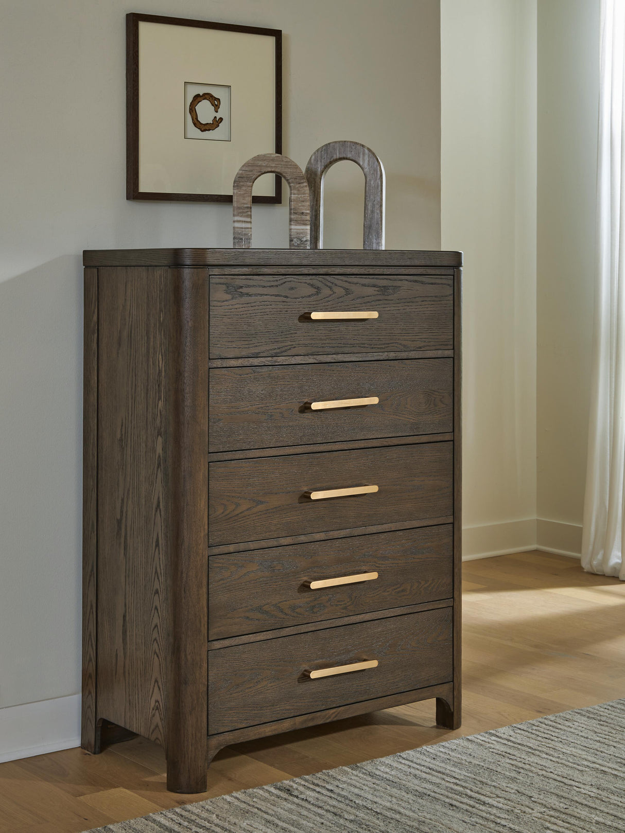 Radkin Burnished Brown Chest of Drawers by Ashley at Eve Furniture