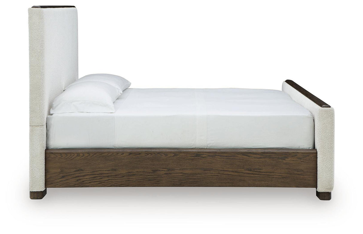 Radkin Burnished Brown Uphostered Panel Bedroom Set by Ashley at Eve Furniture