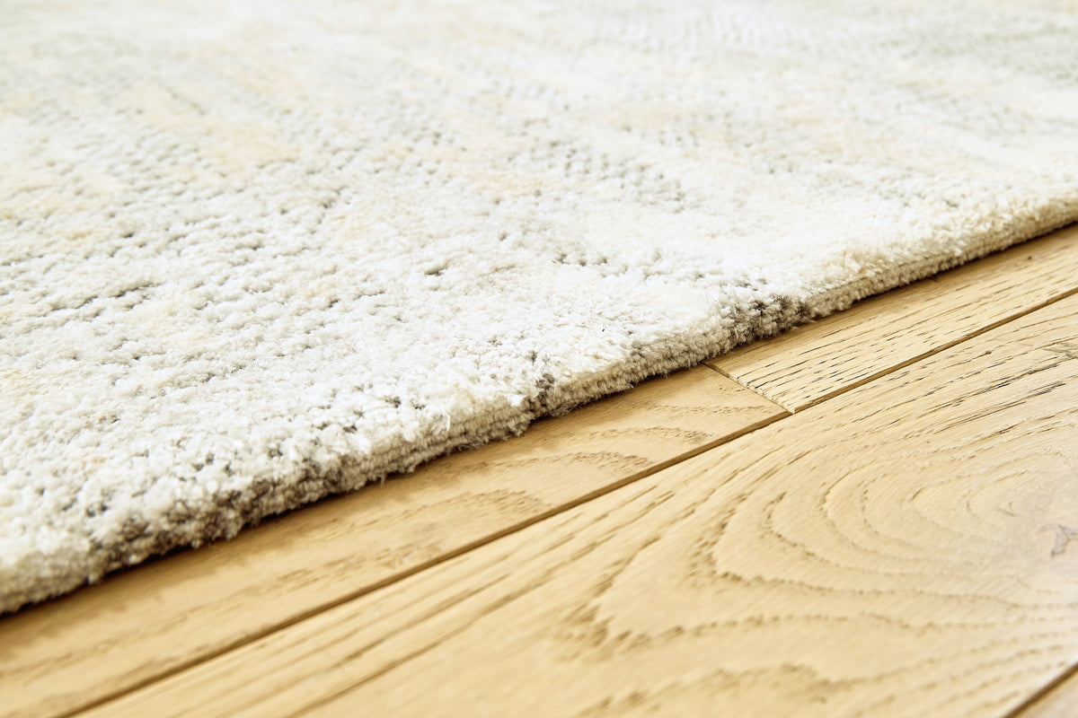 Raif Gray/White/Cream Large Rug by Ashley at Eve Furniture