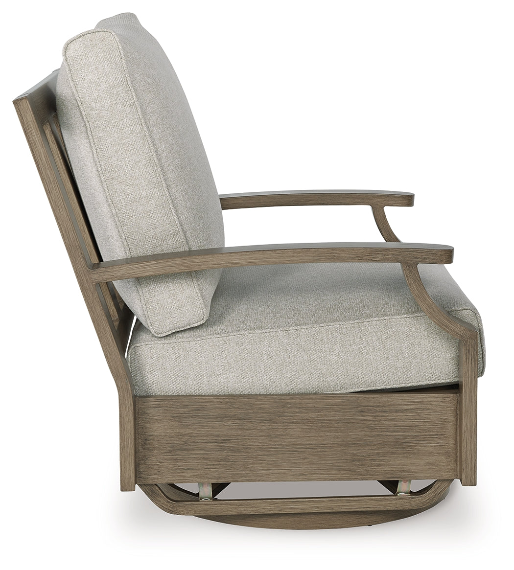 Rainier Ranch Brown/Beige Outdoor Swivel Glider Chair with Cushion by Ashley at Eve Furniture