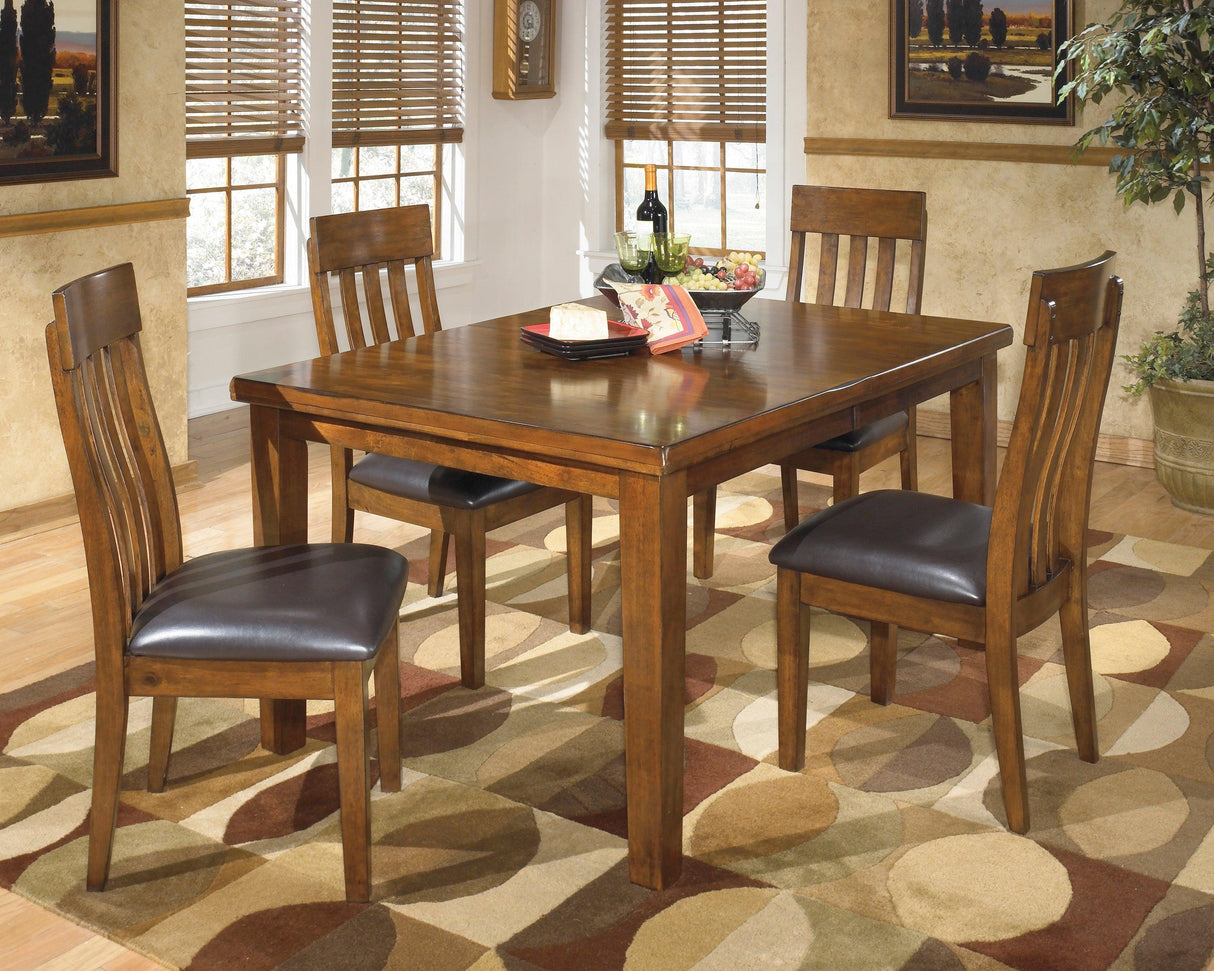 Ralene Medium Brown Extendable Dining Set by Ashley at Eve Furniture
