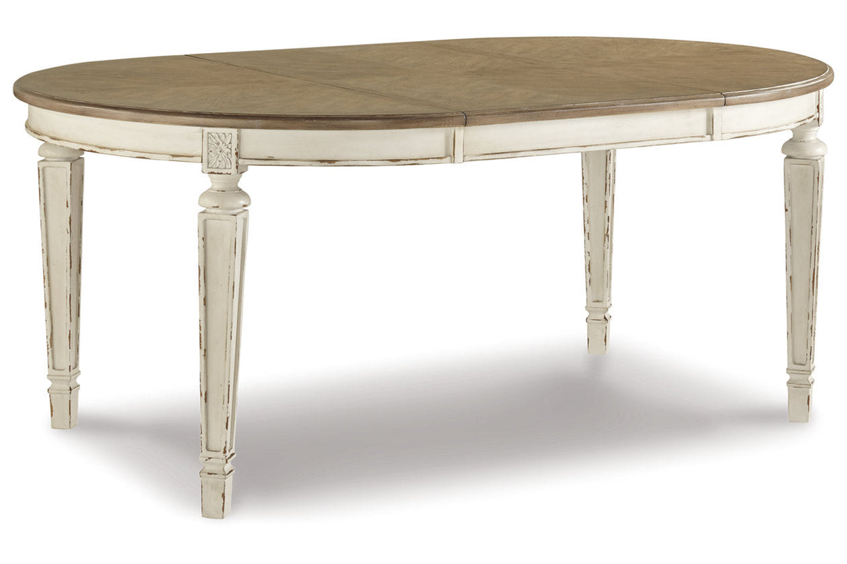 Realyn Chipped White Oval Dining Table and 6 Ladder Back Chairs by Ashley at Eve Furniture