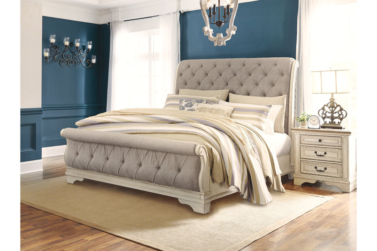 Realyn Chipped White Upholstered Sleigh Bedroom Set by Ashley at Eve Furniture