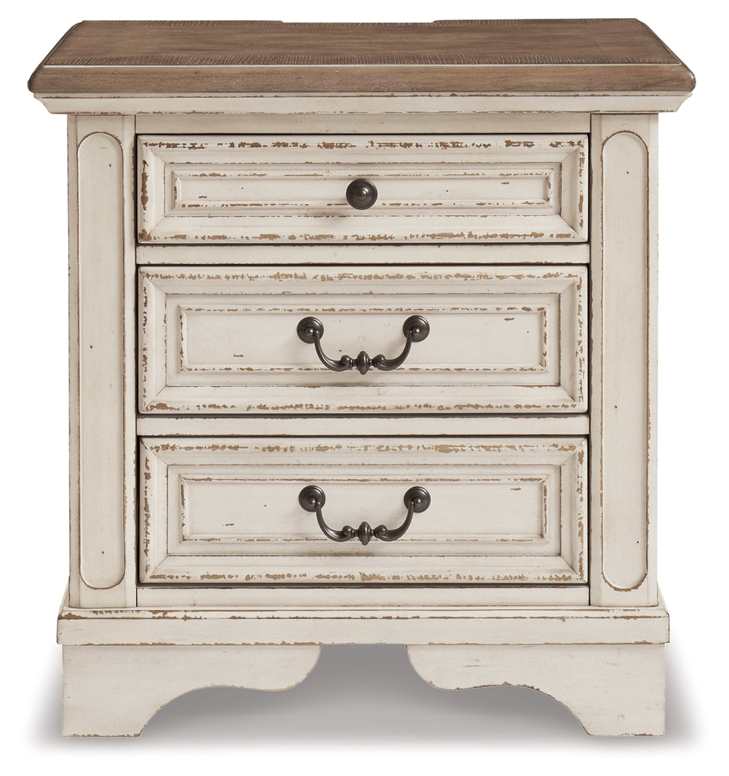 Realyn Chipped White Upholstered Storage Platform Bedroom Set with Footboard Bench by Ashley at Eve Furniture