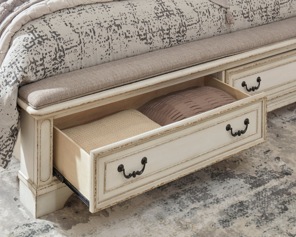 Realyn Chipped White Upholstered Storage Platform Bedroom Set with Footboard Bench by Ashley at Eve Furniture