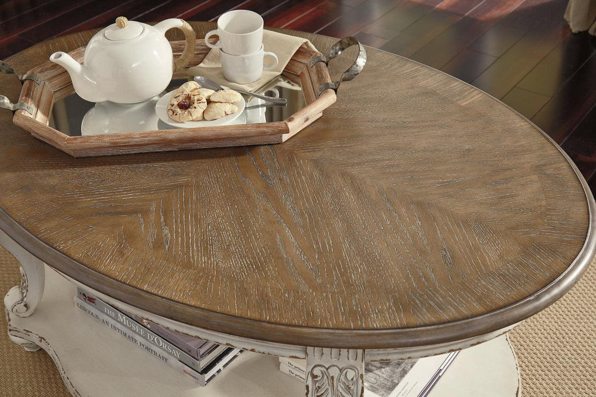 Realyn White/Brown Coffee Table by Ashley at Eve Furniture