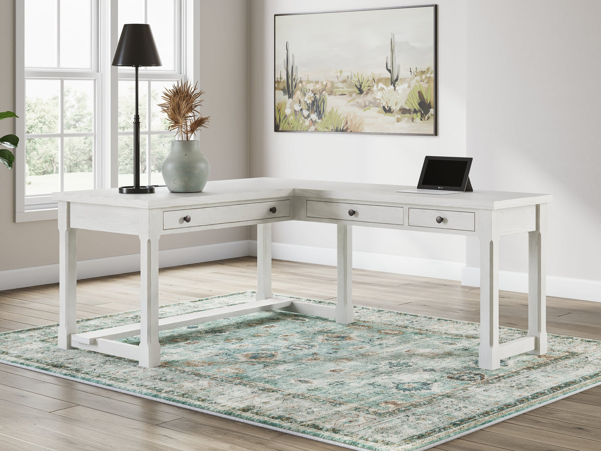 Robbinsdale Antique White L-Shaped Home Office Desk by Ashley at Eve Furniture
