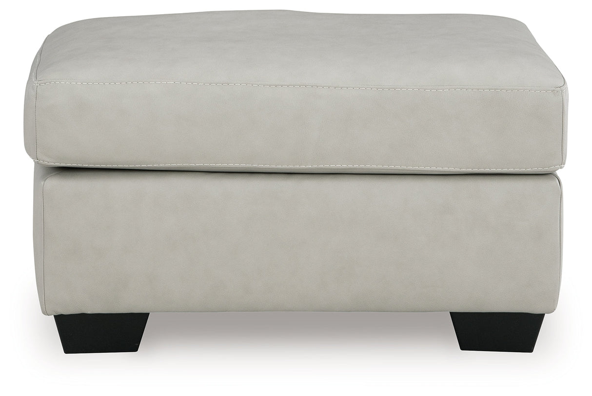 Santorine Bone Ottoman by Ashley at Eve Furniture