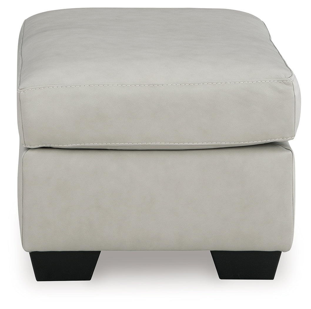 Santorine Bone Ottoman by Ashley at Eve Furniture