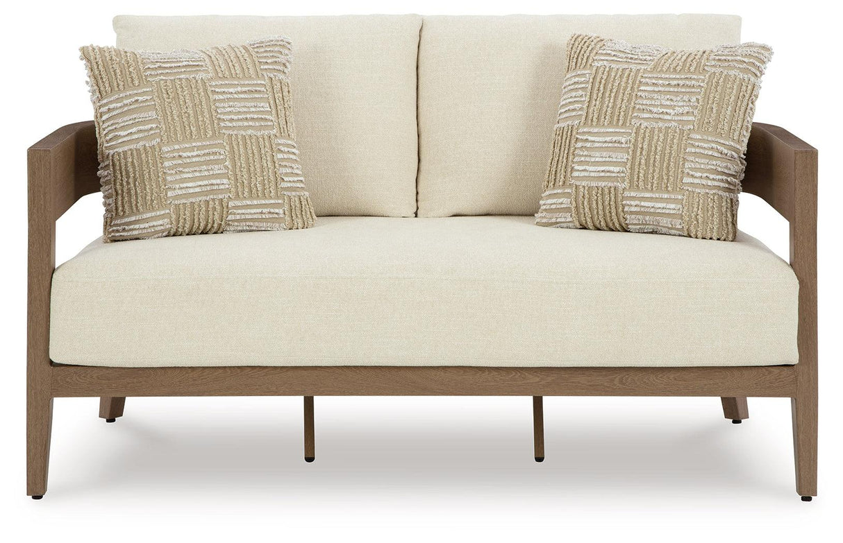 Serene Bay Dark Brown/White Outdoor Loveseat with Cushion by Ashley at Eve Furniture