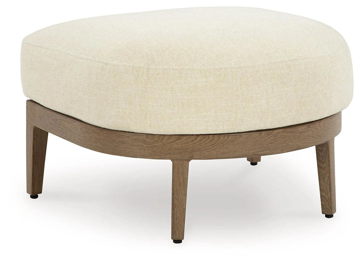 Serene Bay Dark Brown/White Outdoor Ottoman with Cushion by Ashley at Eve Furniture