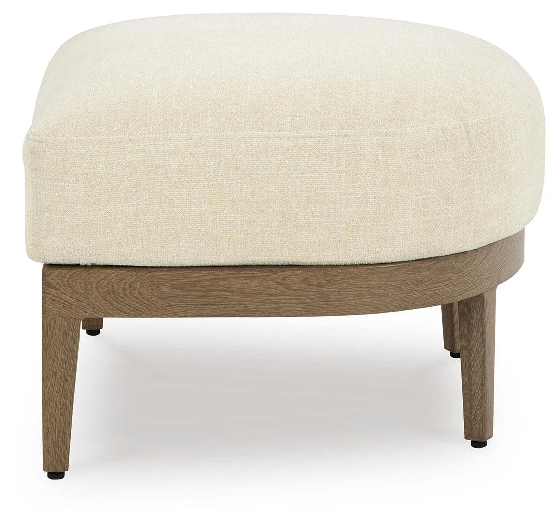 Serene Bay Dark Brown/White Outdoor Ottoman with Cushion by Ashley at Eve Furniture