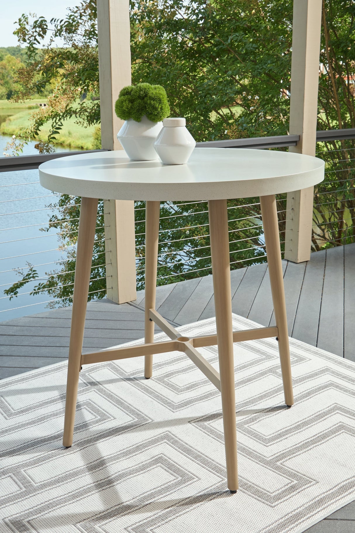 Seton Creek Beige Outdoor Bar Table by Ashley at Eve Furniture
