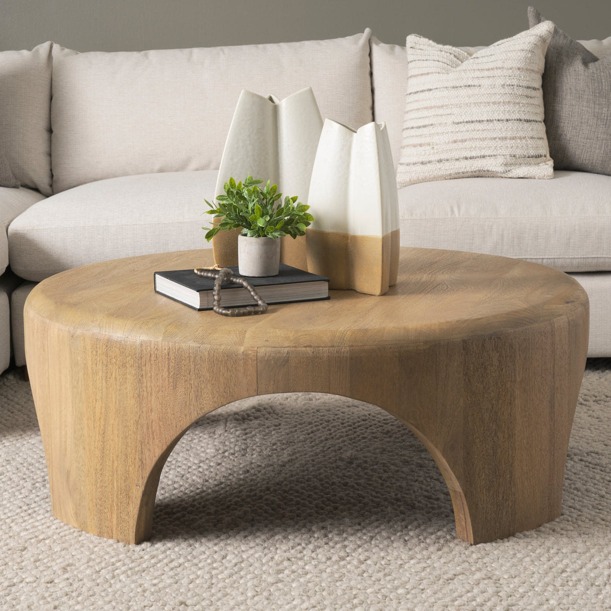 Shima Round Light Brown Wood W/Arched Legs Coffee Table by Mercana at Eve Furniture