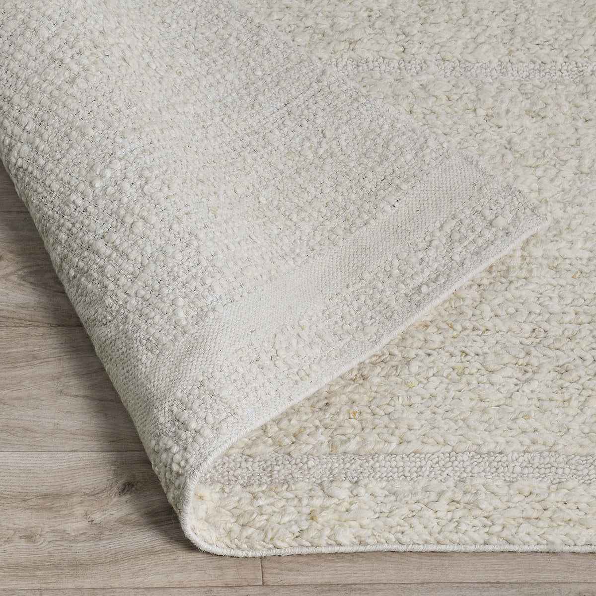 Sinclair Ivory Wool Rug by Classic Home at Eve Furniture