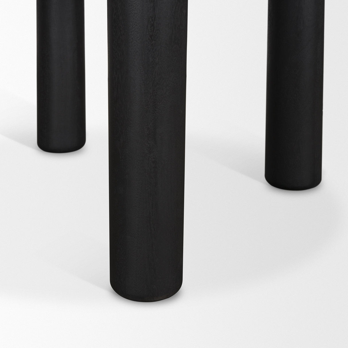 Soma Textured Black Mango Wood Round Dining Table by Mercana at Eve Furniture