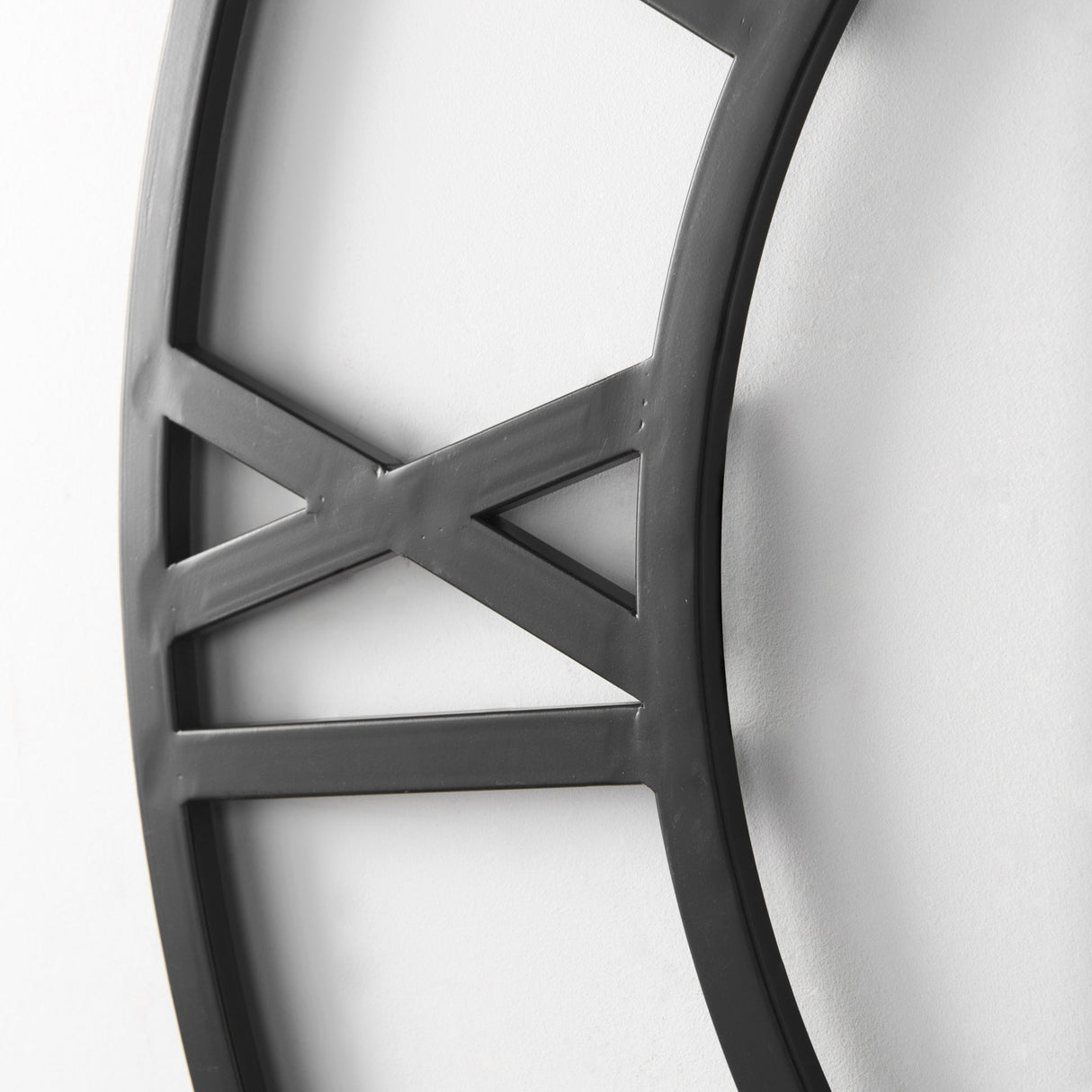 Stoke Round Black Iron Wall Clock by Mercana at Eve Furniture