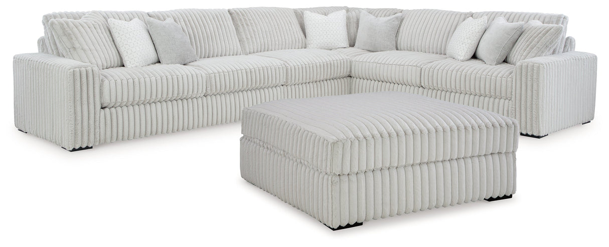 Stupendous 4-Piece Sectional with Ottoman in Alloy by Ashley at Eve Furniture