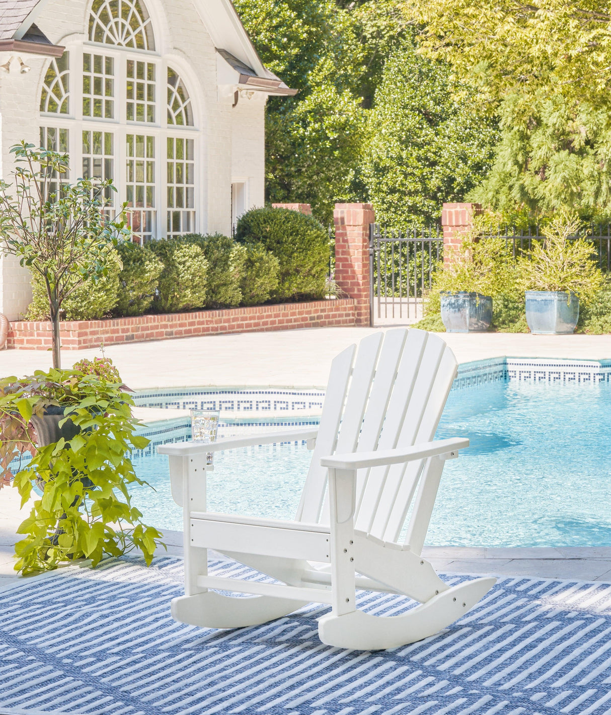 Sundown Treasure White Outdoor Rocking Chair by Ashley at Eve Furniture