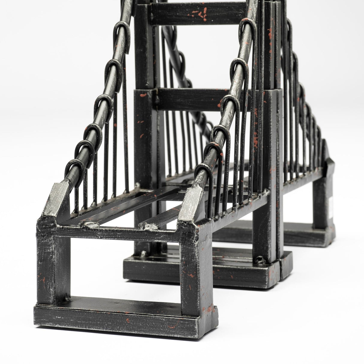 Suspension Set of 2 Brown Wrought Iron Suspension Bridge Bookends by Mercana at Eve Furniture