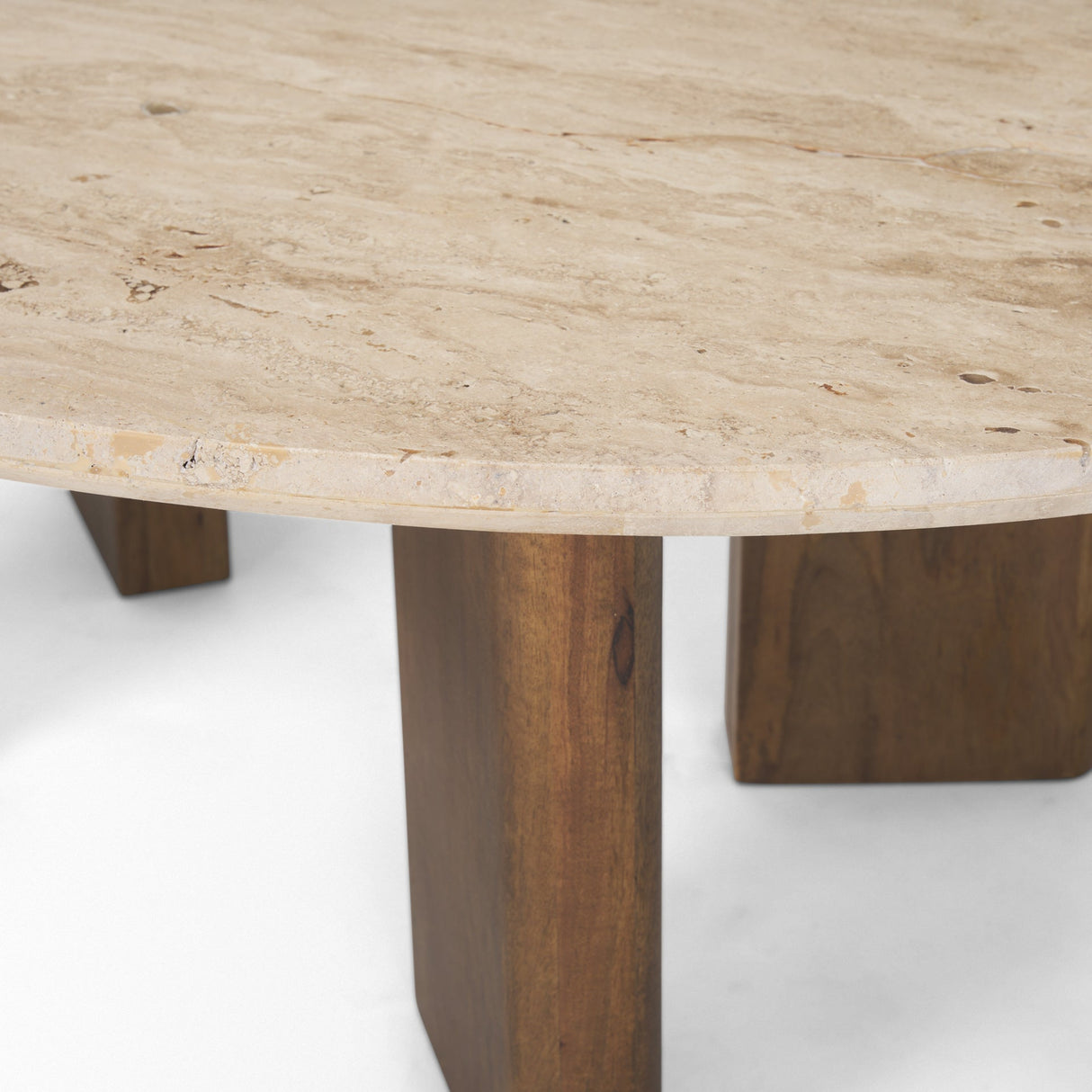 Syona Travertine + Mango Wood leg Oval Coffee table by Mercana at Eve Furniture