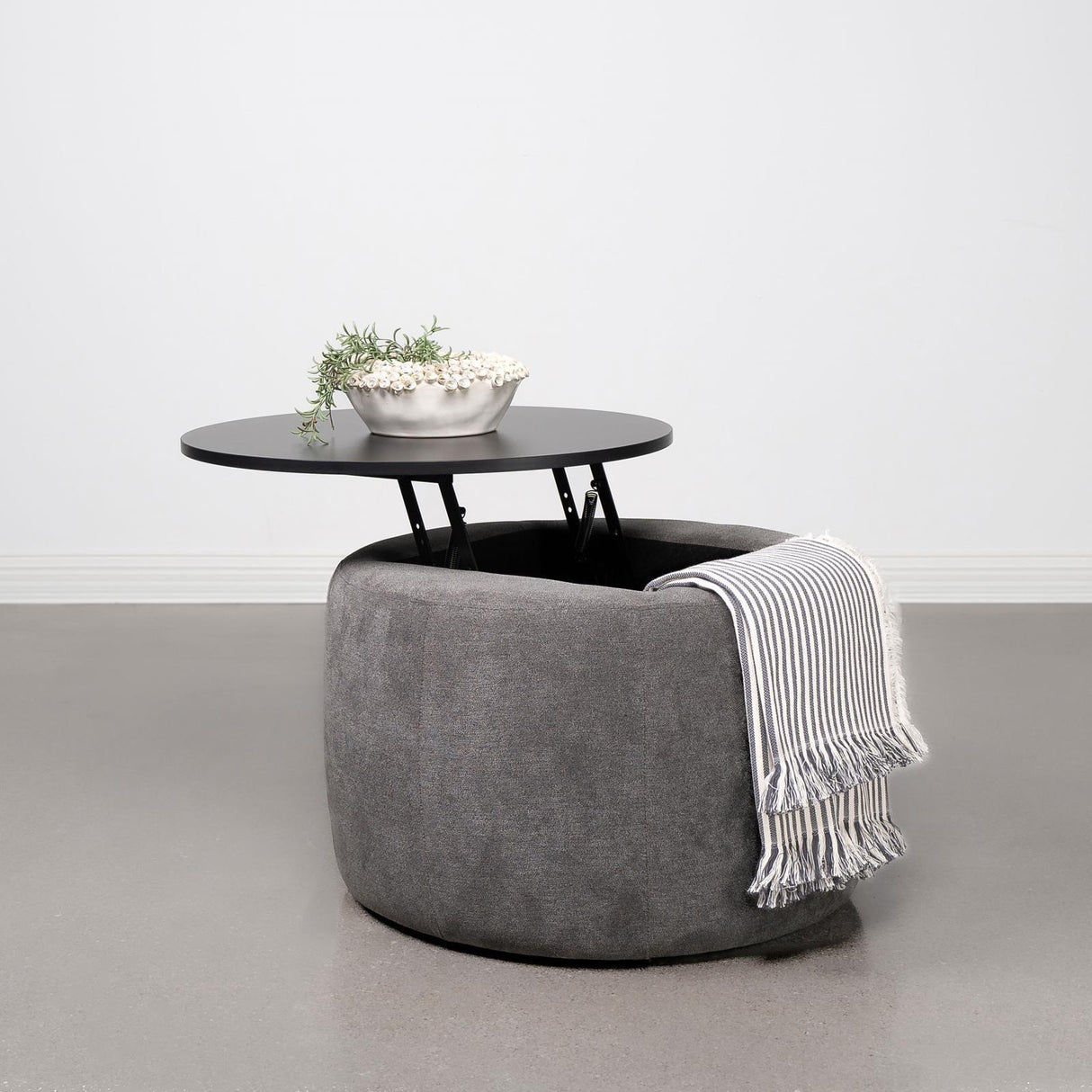 Tesoro Grey and Black Upholstered Round Lift Top Storage Ottoman by Coaster at Eve Furniture