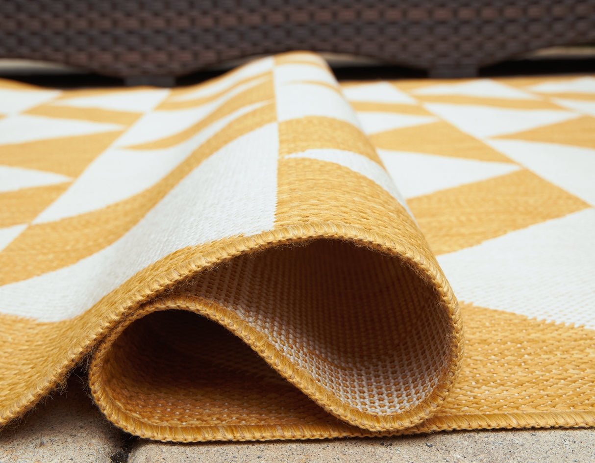 Thomley Ivory/Yellow 5' x 7' Rug by ASHLEY FURNITURE at Eve Furniture