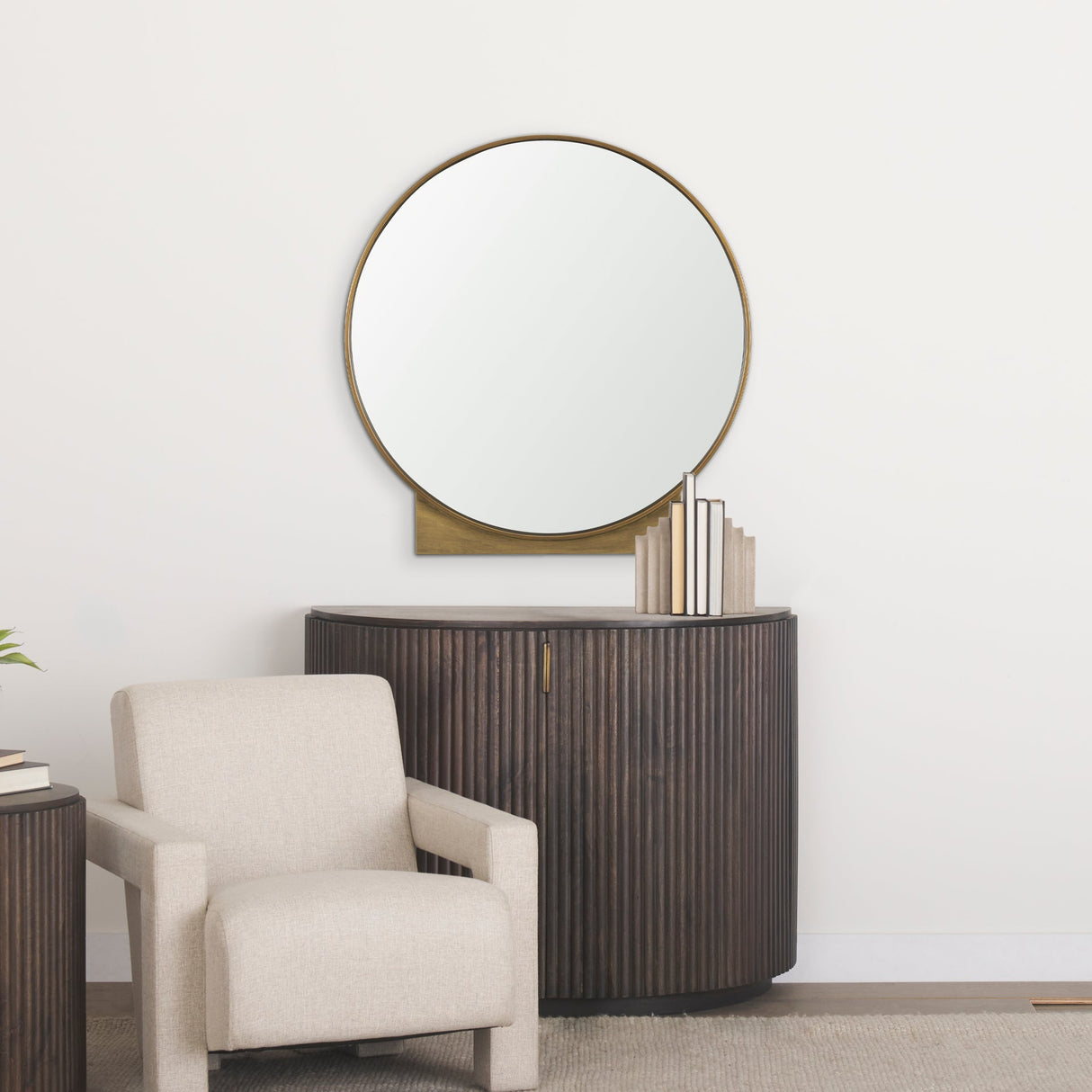 Tillie Round Brushed Gold Metal Frame Wall Mirror by Mercana at Eve Furniture