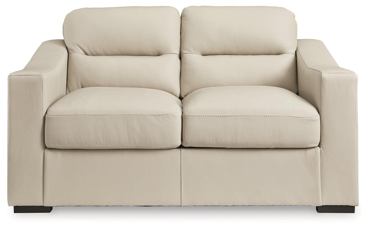Treasure Trove Almond Loveseat by Ashley at Eve Furniture