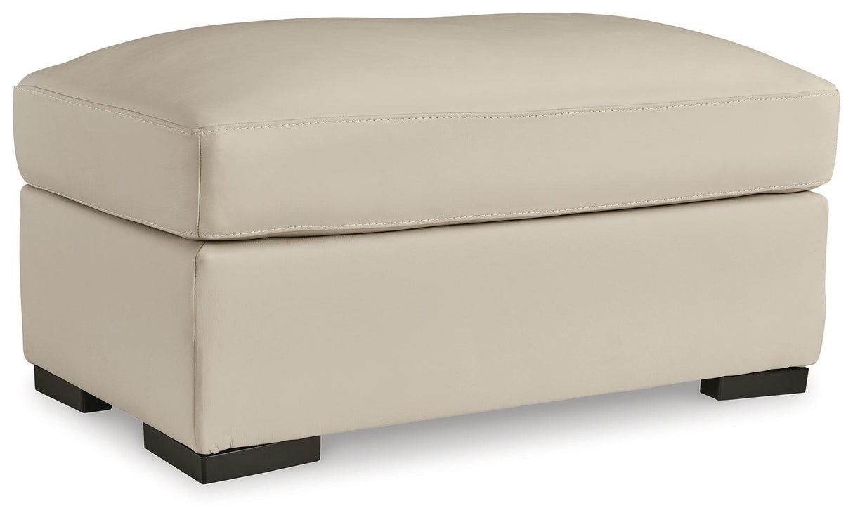 Tresure Trove Almond Ottoman by Ashley at Eve Furniture