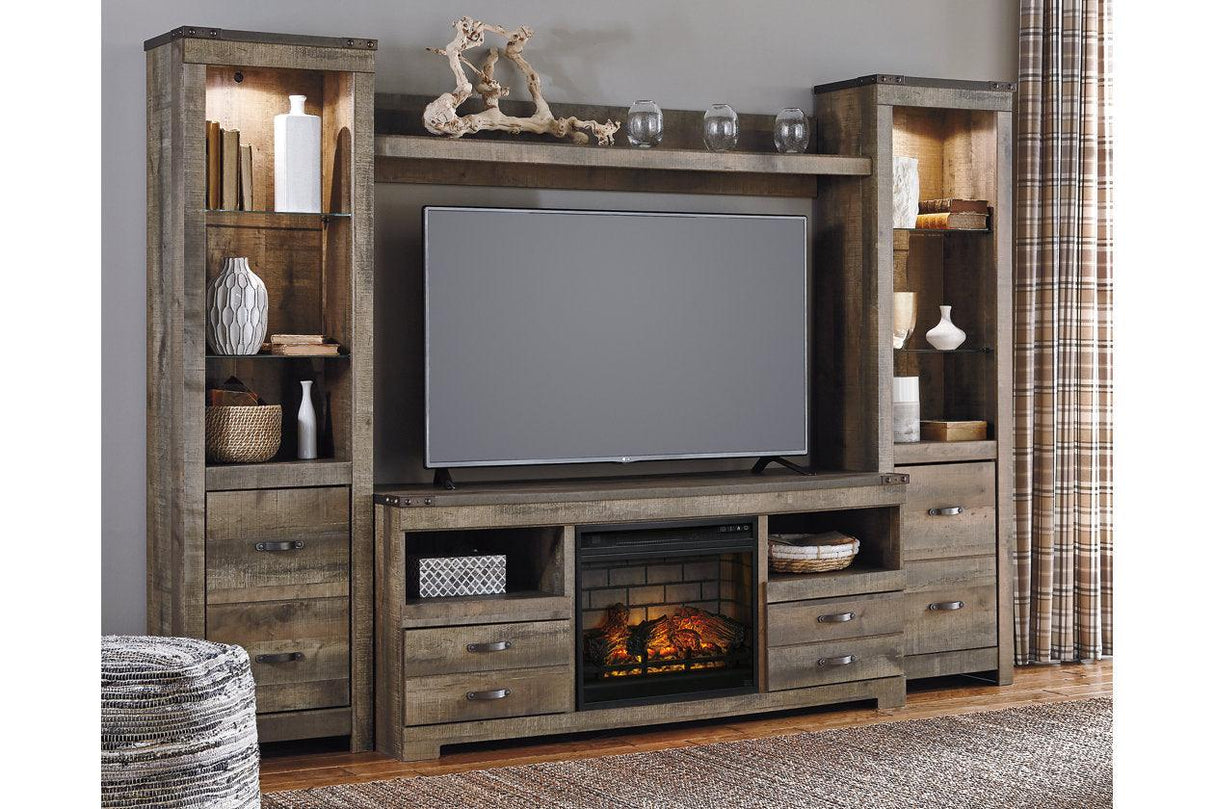 Trinell Brown 4-Piece Entertainment Center with Electric Fireplace by Ashley at Eve Furniture