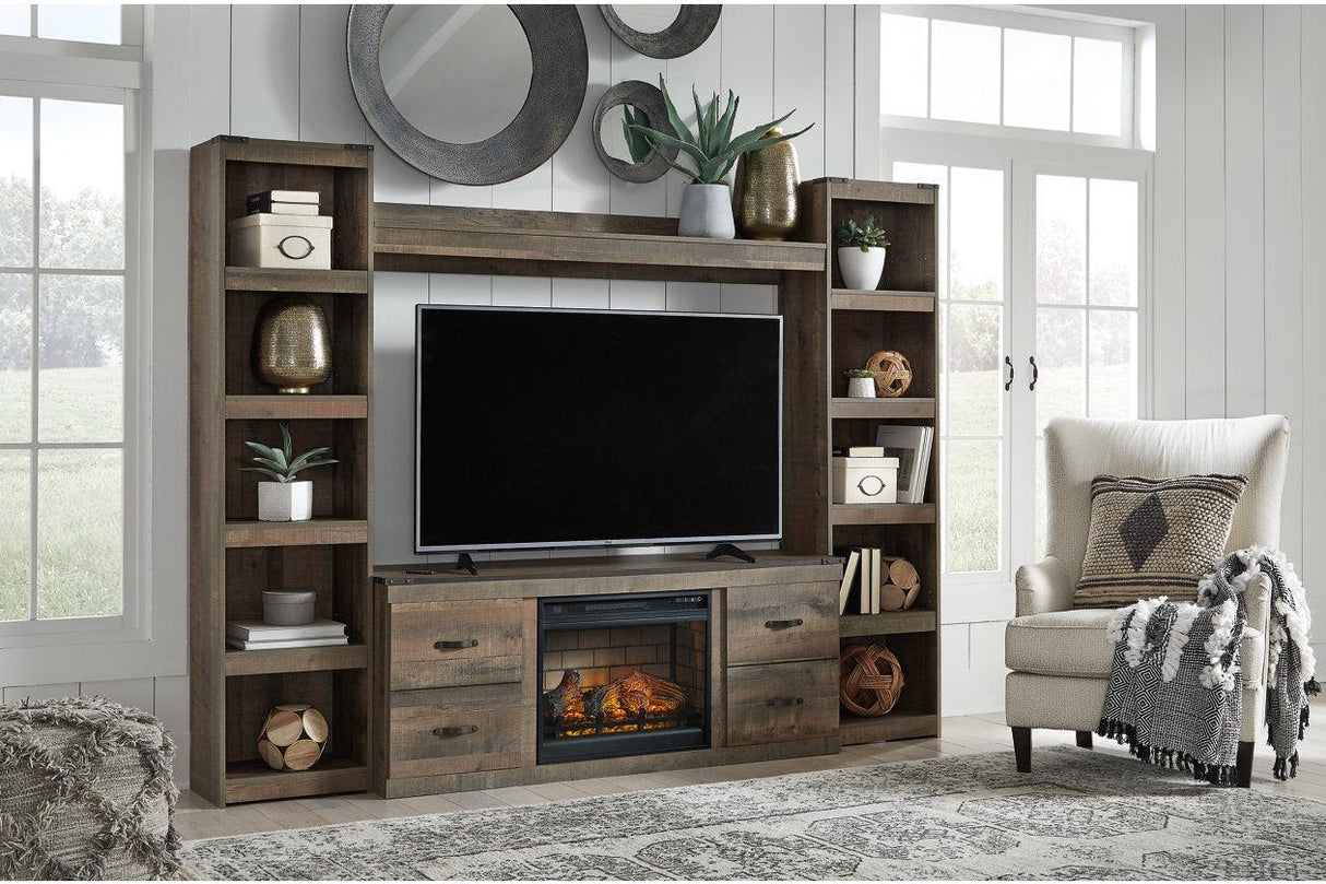Trinell Brown 4-Piece Entertainment Center with Electric Fireplace by Ashley at Eve Furniture