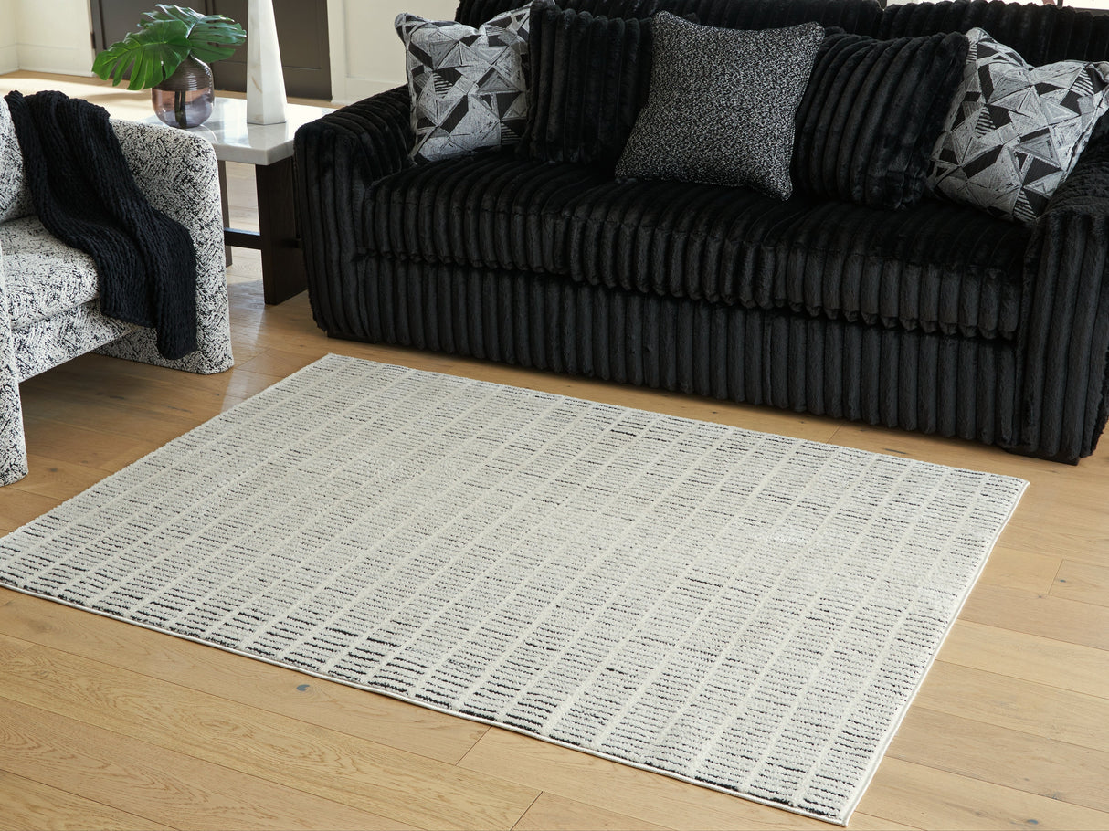 Turinwith Ivory/Black Medium Rug by Ashley at Eve Furniture