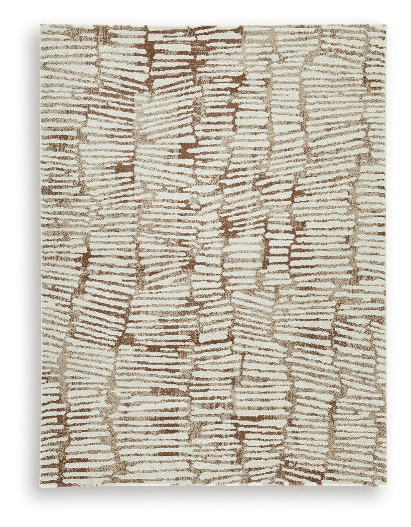 Uduak Cream/Tan/Rust Medium Rug by Ashley at Eve Furniture