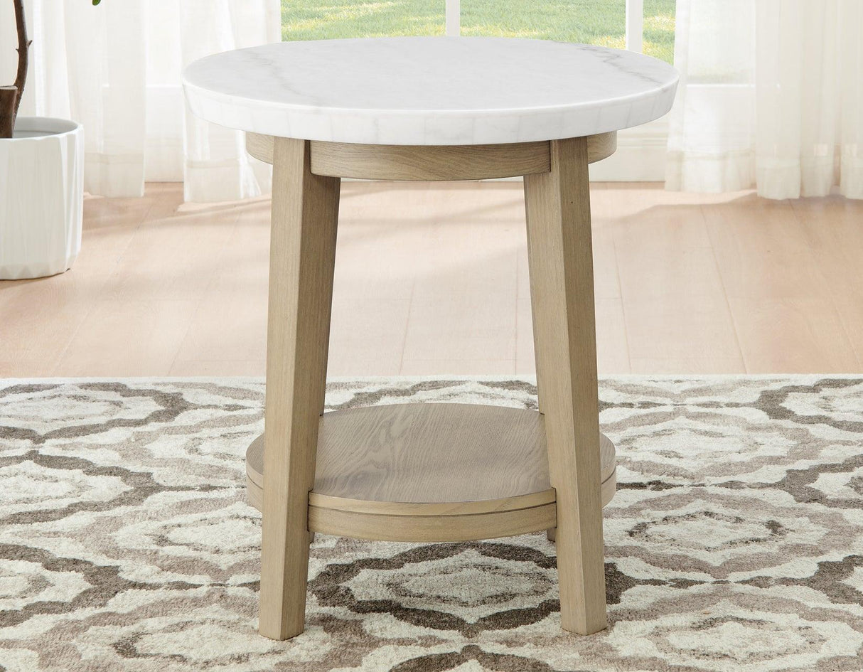 Vida 22″ Round White Marble Top End Table by Steve Silver at Eve Furniture