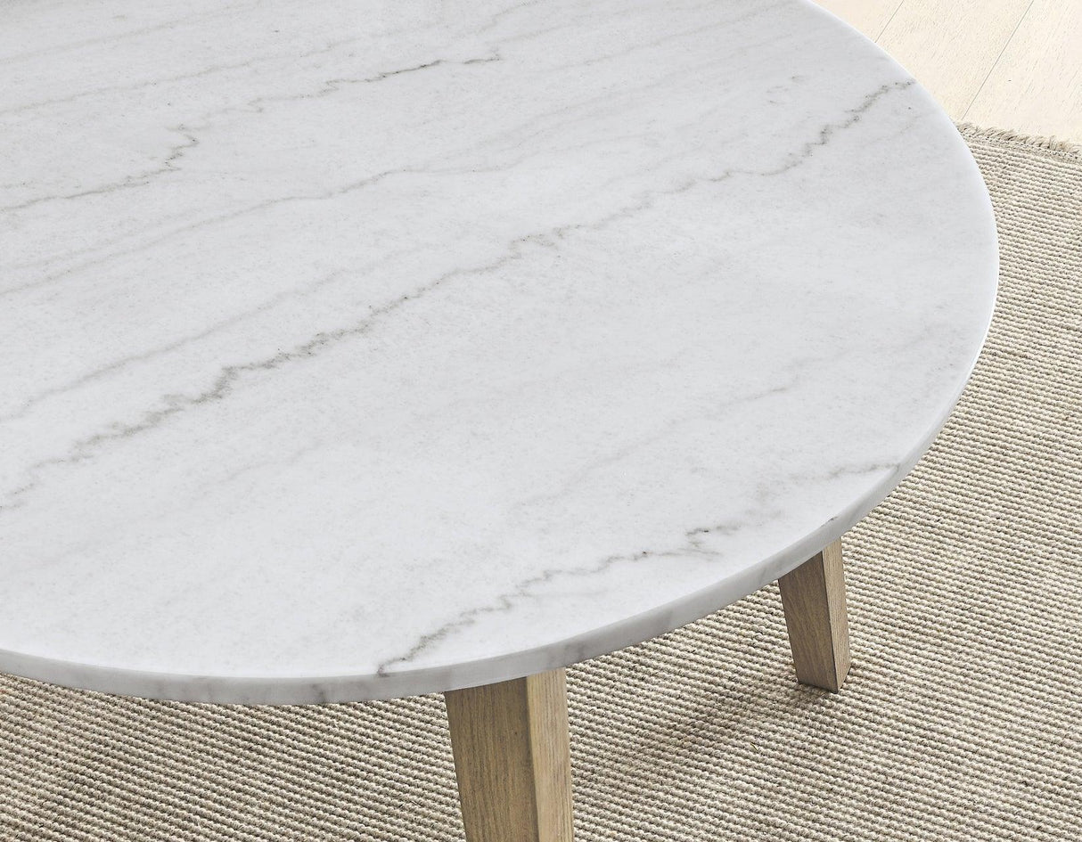 Vida 48″ Round White Marble Dining Table by Steve Silver at Eve Furniture