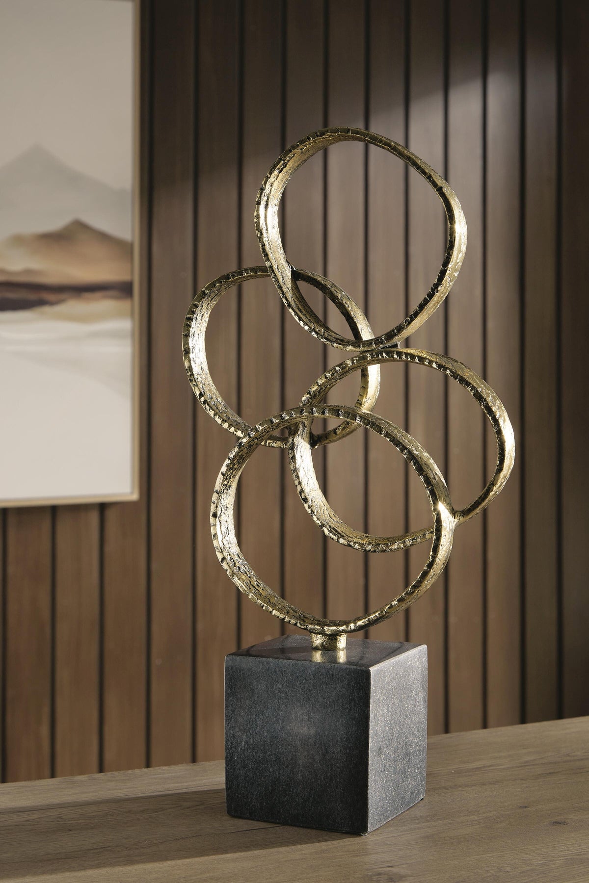 Wellcott Gold Finish/Black Sculpture by Ashley at Eve Furniture