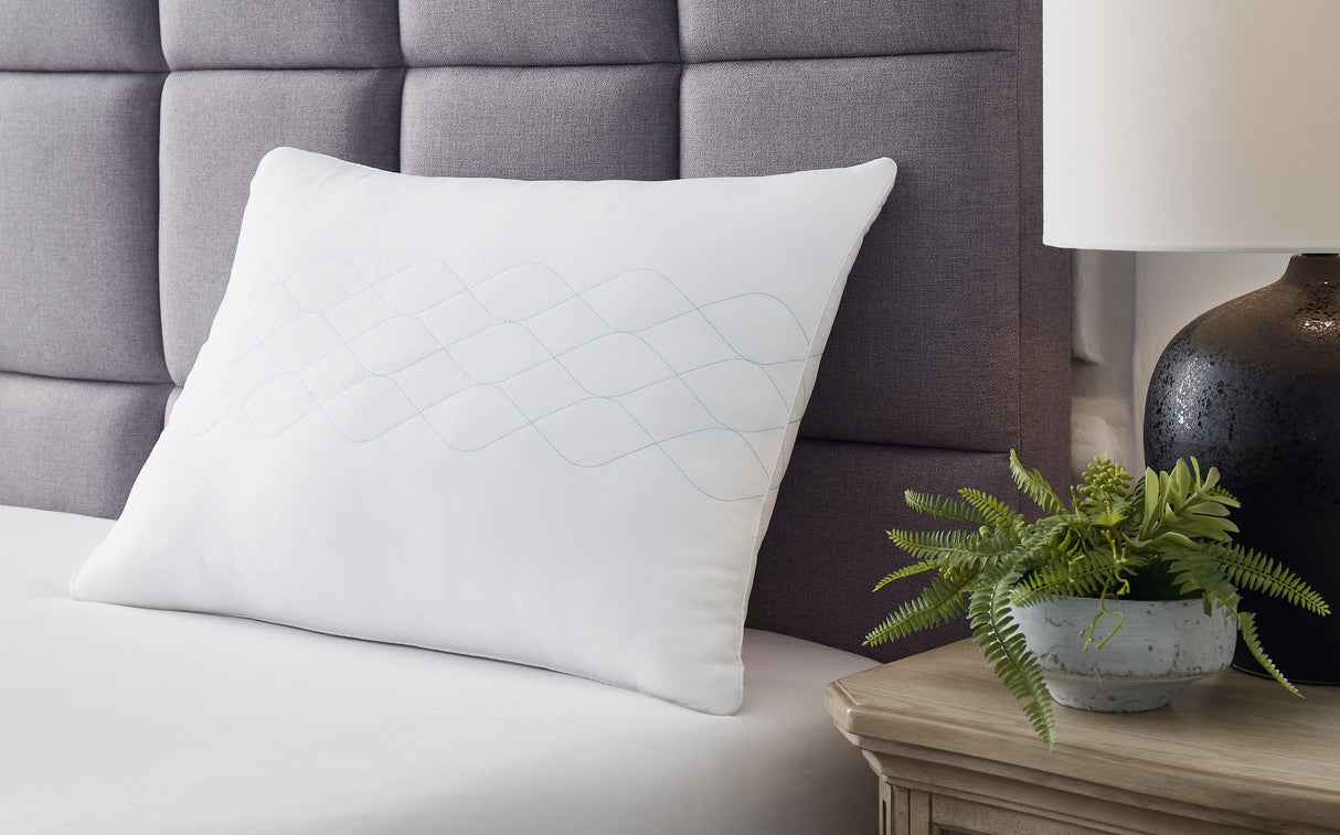 White Comfort Pillow by Ashley at Eve Furniture