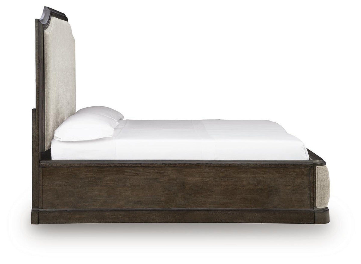 Wickenger Dark Brown King Upholstered Panel Bed by Ashley at Eve Furniture
