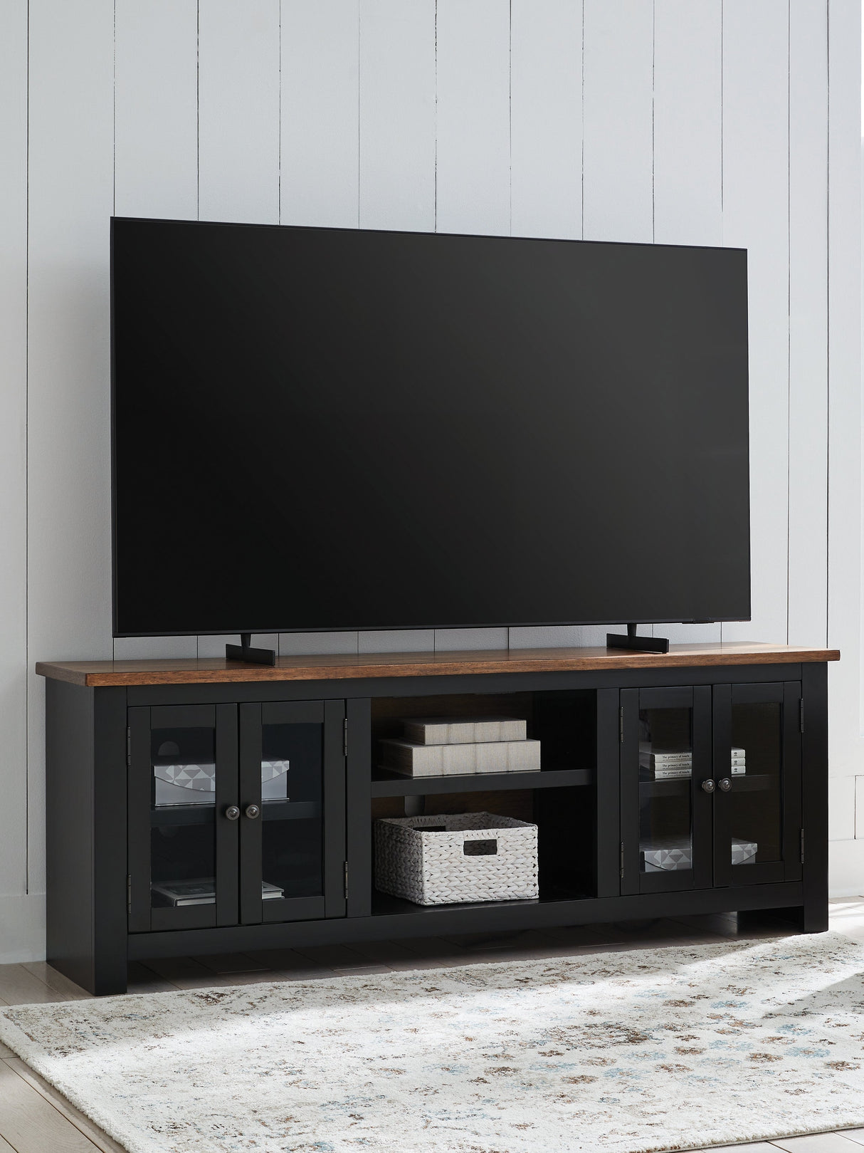 Wildenauer Brown/Black 76" TV Stand by Ashley at Eve Furniture