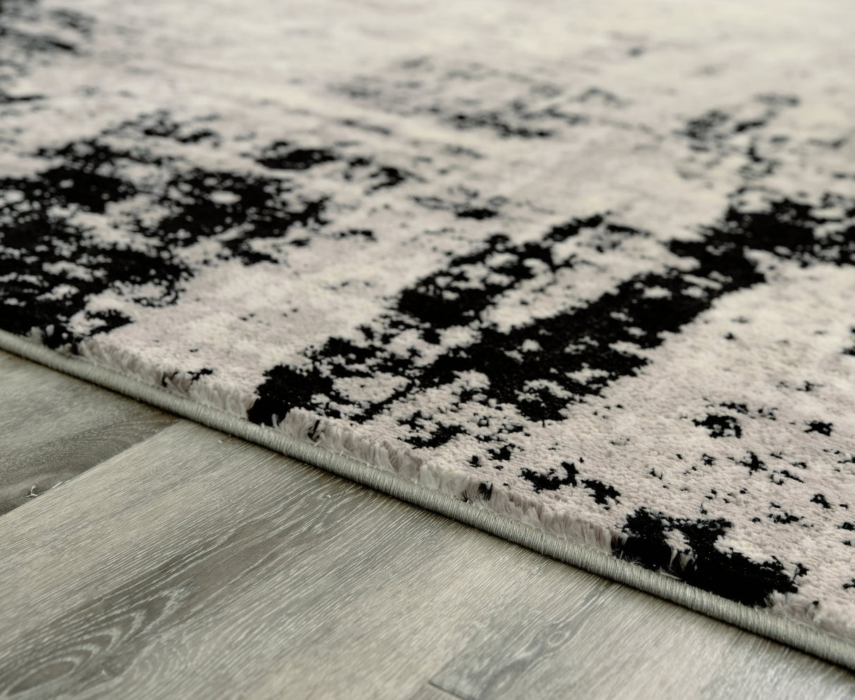 Zekeman Black/Cream/Gray Large Rug by Ashley at Eve Furniture