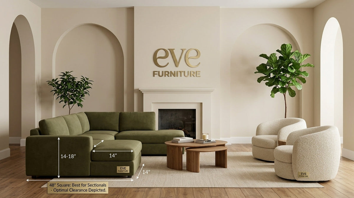 An olive green sofa styled in an organic modern living room with a light oak coffee table and cream accent ottoman.