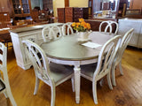 Realyn Chipped White Extendable Round/Oval Ladder Dining Set