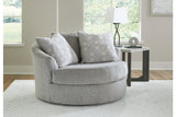 Casselbury Cement Oversized Swivel Chair and Ottoman