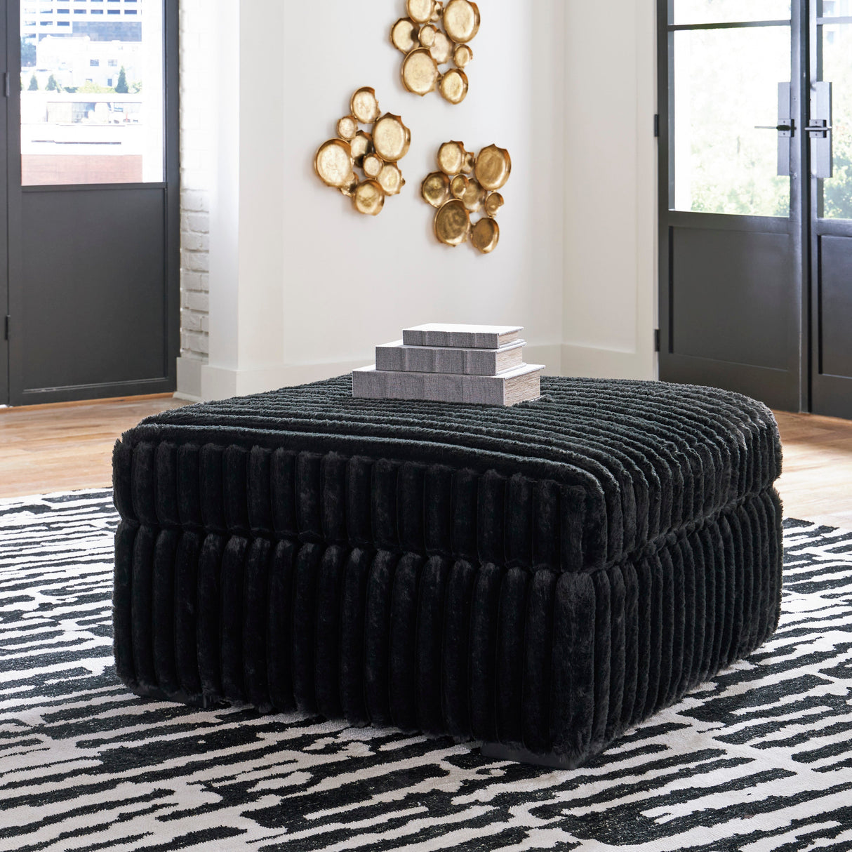 Midnight-Madness Onyx RAF Chase Sectional and Ottoman