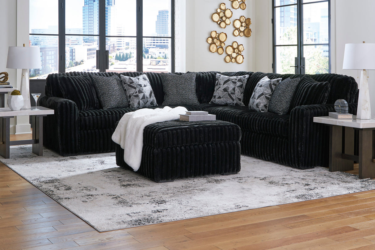 Midnight-Madness 3-Piece Sectional with Ottoman in Onyx