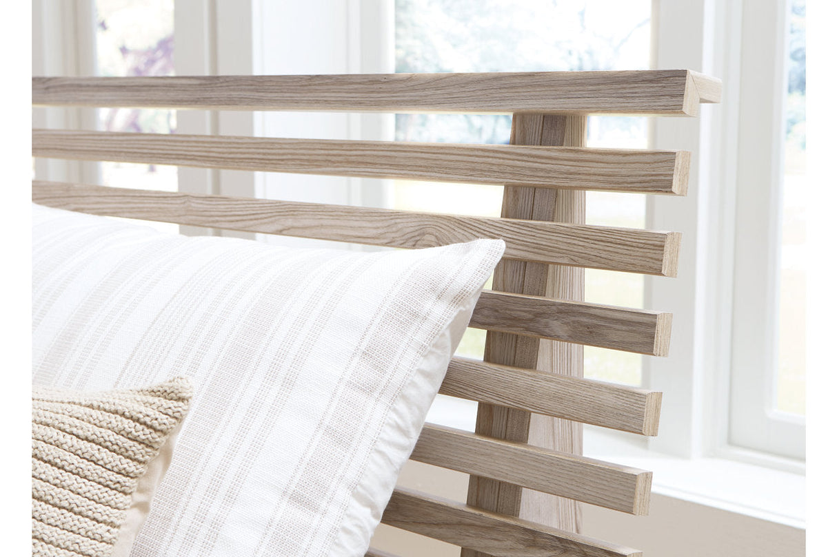 Hasbrick Tan King Slat Panel Bed