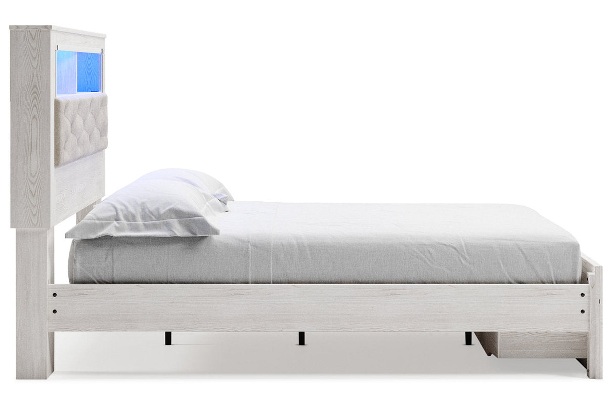 Altyra White Queen Upholstered Platform Bookcase Bed with Storage