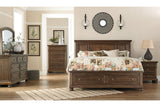 Flynnter Medium Brown Queen Panel Bed with 2 Storage Drawers